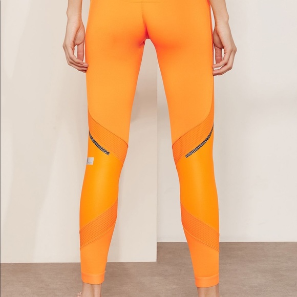 Adidas by Stella McCartney orange running tights with reflective details - Picture 2 of 3